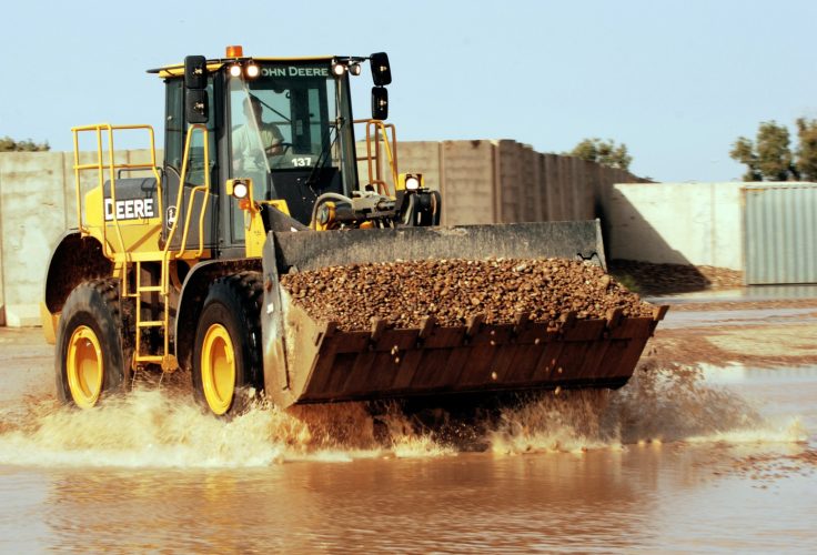 John Deere feels impact of energy slowdown in 3Q as construction equipment sales fall 13%.